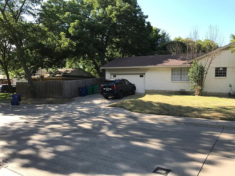 Driveway and back yard fence