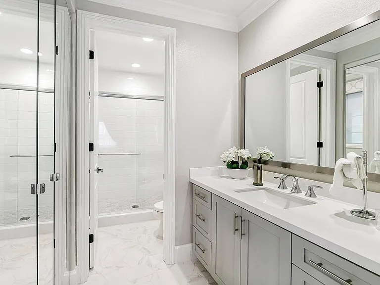 This luxurious bathroom is en suite and completes the comfortable first level guest accommodations.