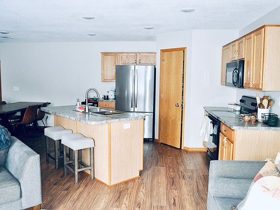 Main living space with kitchen, dining and living