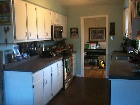 Kitchen has cement countertops
