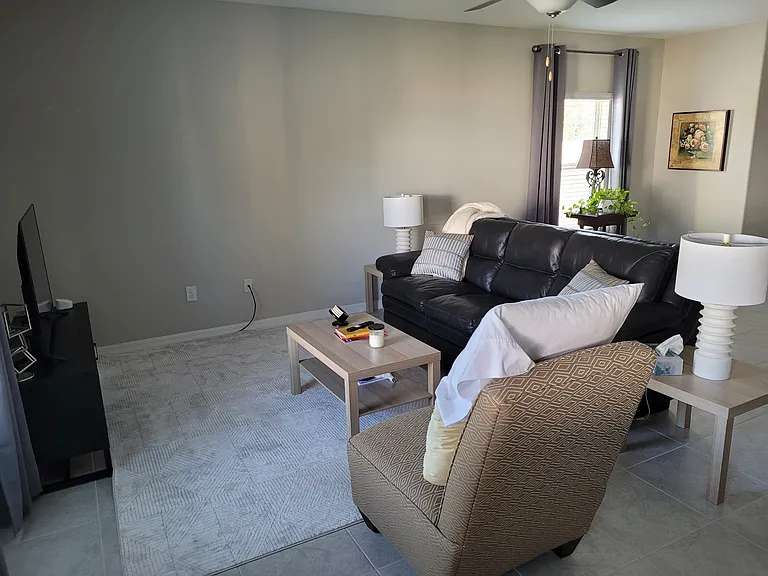 Living room area with Smart TV