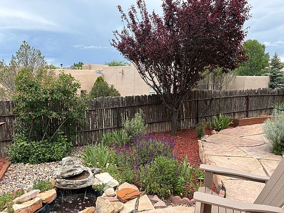 Backyard with patio and fountain
