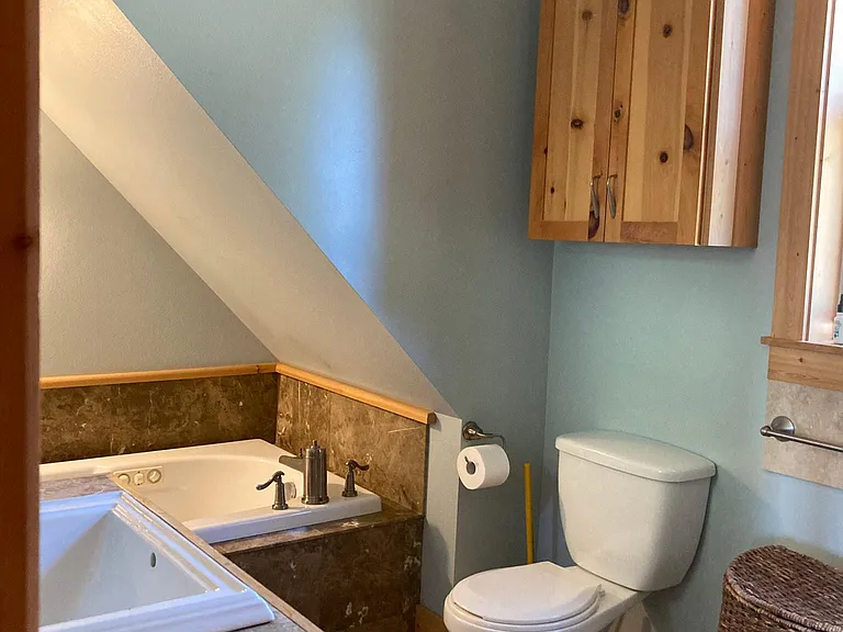 Upper Floor bathroom has Jetted Tub and walk in shower. Other 2 bathroom have same finishes.
