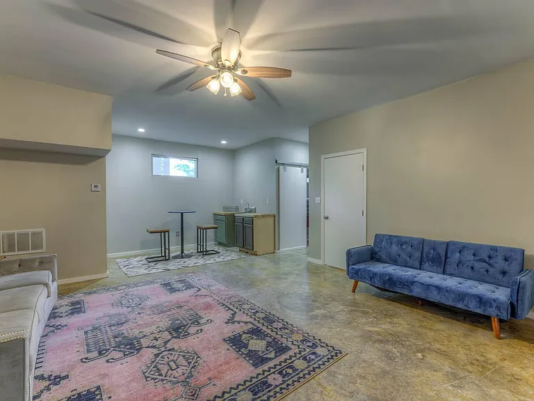 Bonus room with polished concrete and wet bar