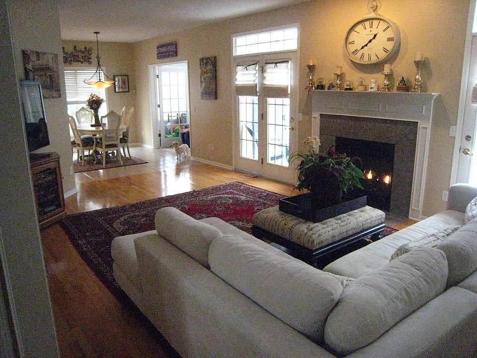 Main level family room with FP