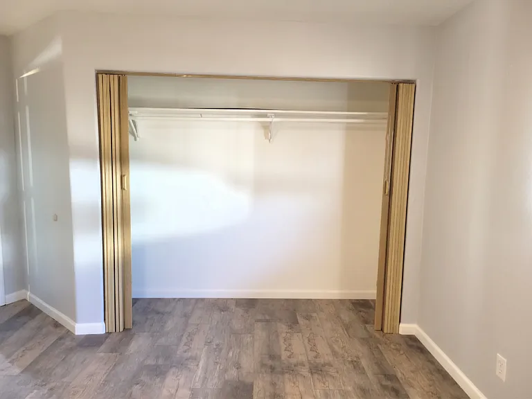 Master bedroom - this image does not show the actual size of bedroom, but you can comfortably have a king size bed with dressers in room. 

There is also a door from the master bedroom that leads to an enclosed area outside