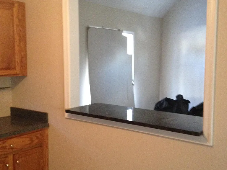 Pass thru-Kitchen Bar to Den