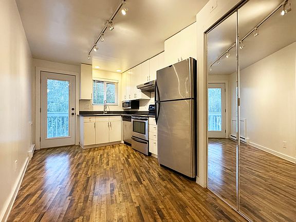 Laundry Behind Mirrored Bi-Fold Door
