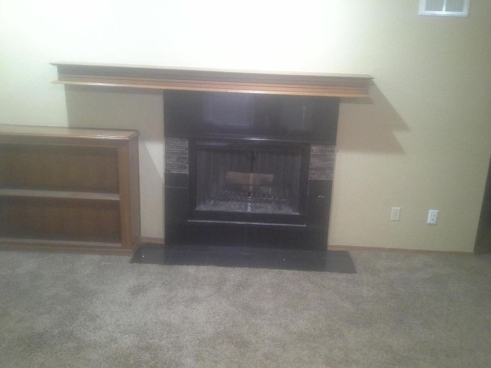 LIVING ROOM WITH NEW UPDATED FIREPLACE