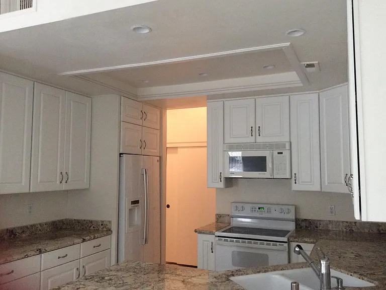 Kitchen 
electric stove microwave side by side refrigerato
