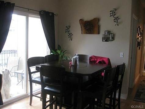 Dining room area with balcony.