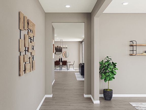 Foyer Looking into Great Room with Laminate Wood Flooring