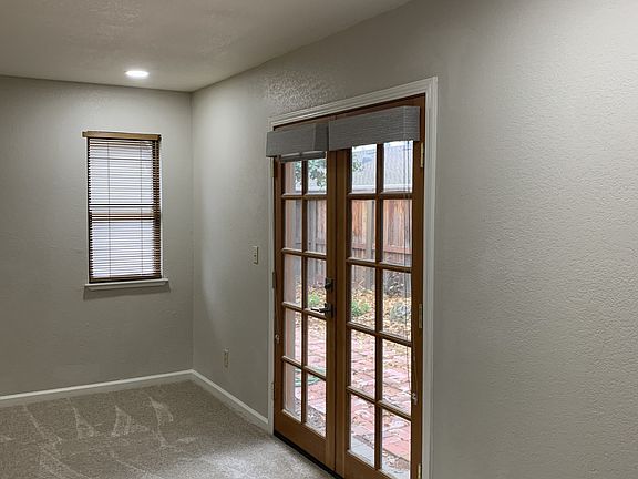 First floor family room with French doors leading to the backyard.