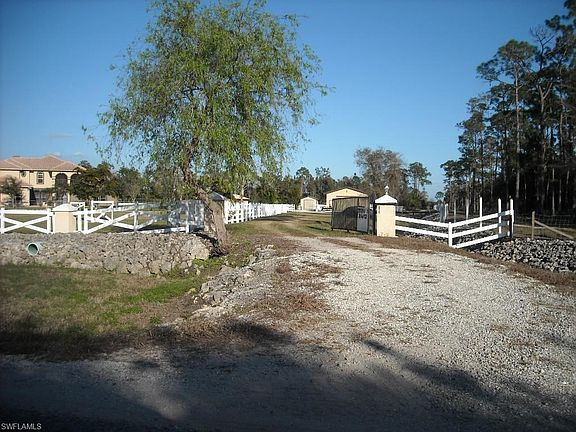 This is the neighboring property to the north....a beautiful estate home & ranch!