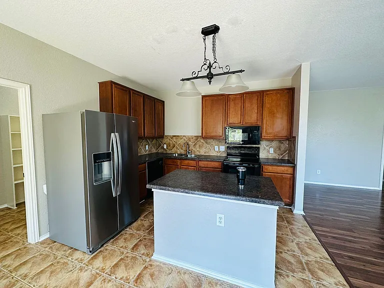 Kitchen with brand new Refrigerator