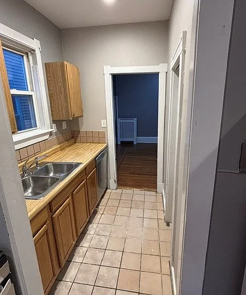 Sink and Pantry Room Attached to Kitchen