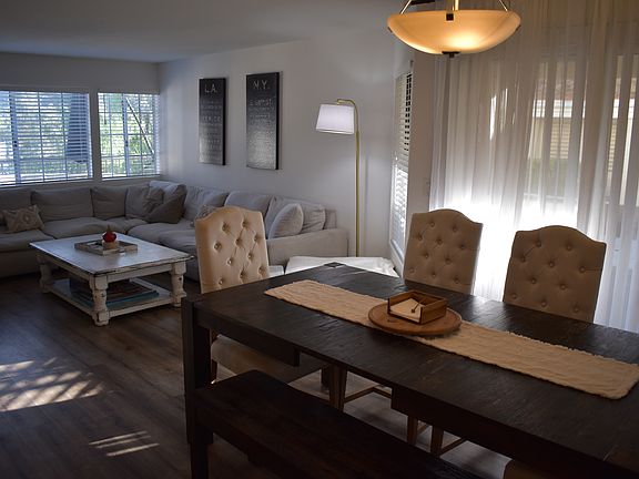 The slider in the dining area leads to the patio area to enjoy the outdoors.