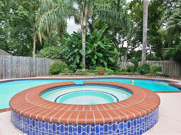 Tropical Back Yard with Pool and Spa is Great for Entertaining