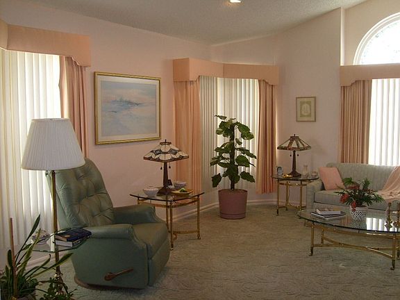 Living room with lead glass paladium window