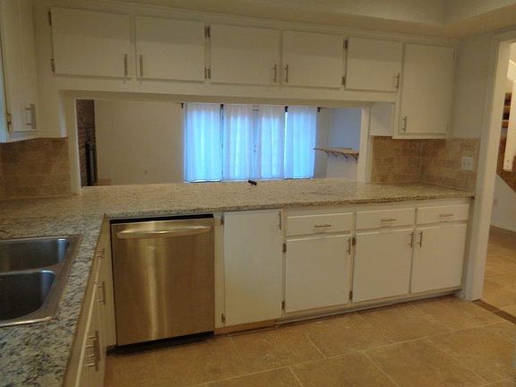 Kitchen Area - Granite with Travertine Backsplash, Stainless Steel Appliances