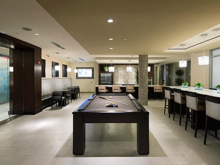 Play a game of pool with friends and neighbors in our luxury club suite
