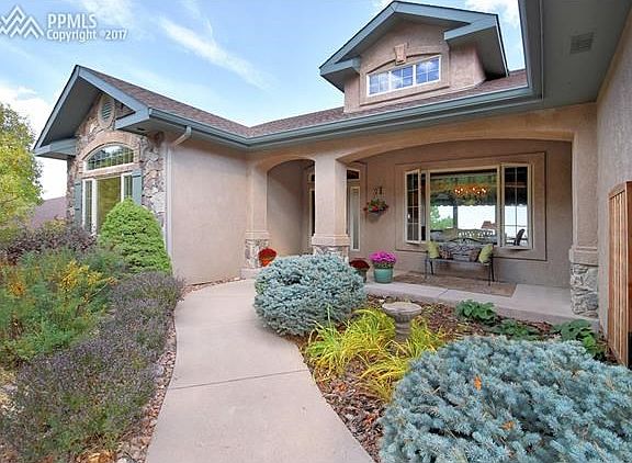 Excellent curb appeal with low maintenance xeriscape landscaping