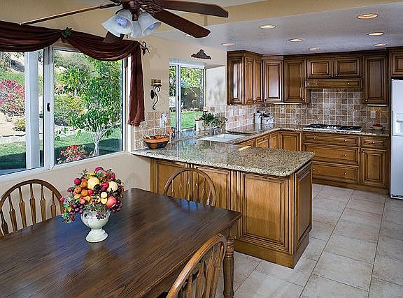 Gorgeous gourmet kitchen with maple cabinets and granite counters