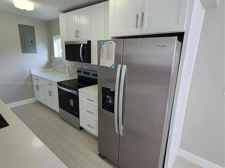 1240 NE 207th Ter — Photo 3