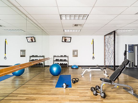 Fitness center equipped with TRX and barre