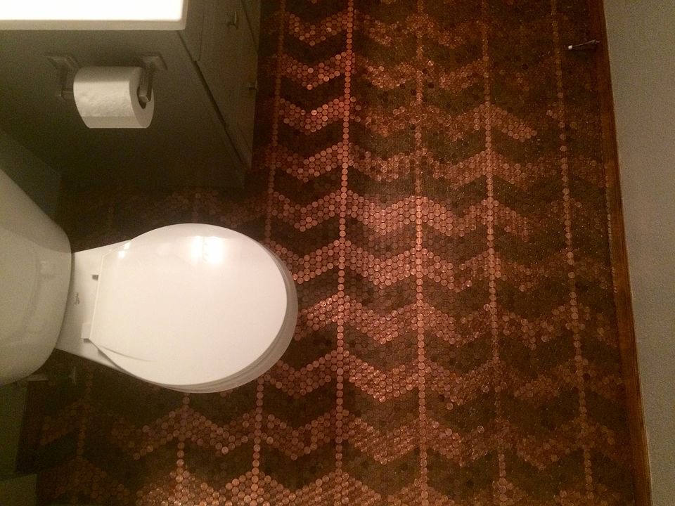 4,500 pennies laid on floor