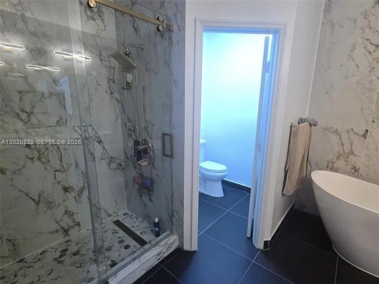 5469 NW 113th Ct — Photo 22