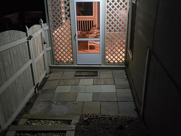 Night time entrance view, automatic lighting with each step.