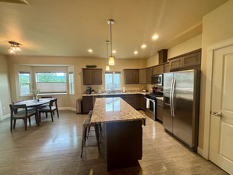 Open concept kitchen, dining, living room