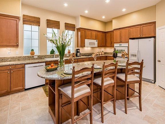 Kitchen with Versailles floor pattern, granite counters, Island