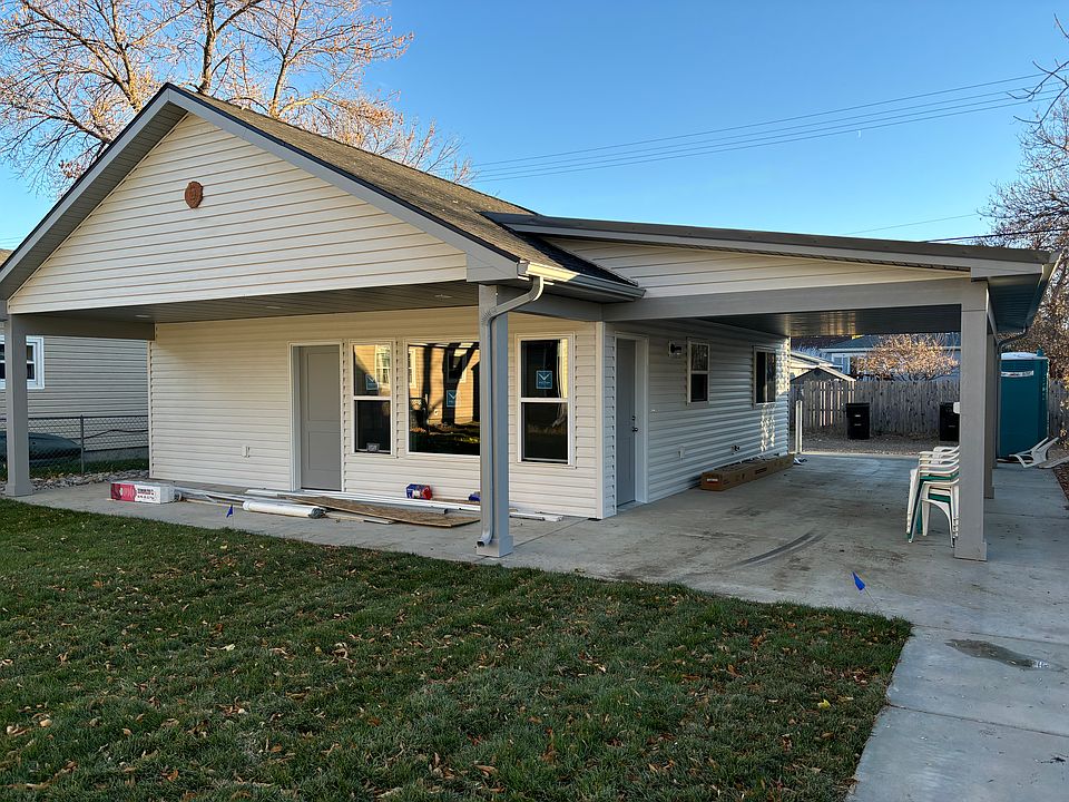 Front View of Brand New Construction One Bedroom 754 Square Feet Home with Large Front Covered Patio (182 Sq Ft) and Large Covered Carport (348 Sq Ft) Automatic Underground Sprinkling System "It's a BEAUTY"