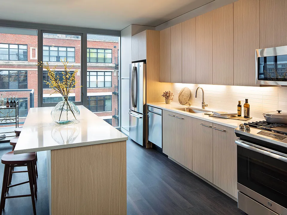 Elegant island kitchen with stainless-steel appliances
