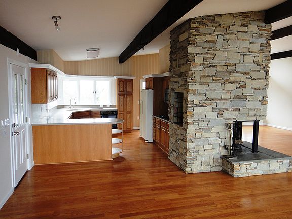 Open Kitchen and Slate Fireplace