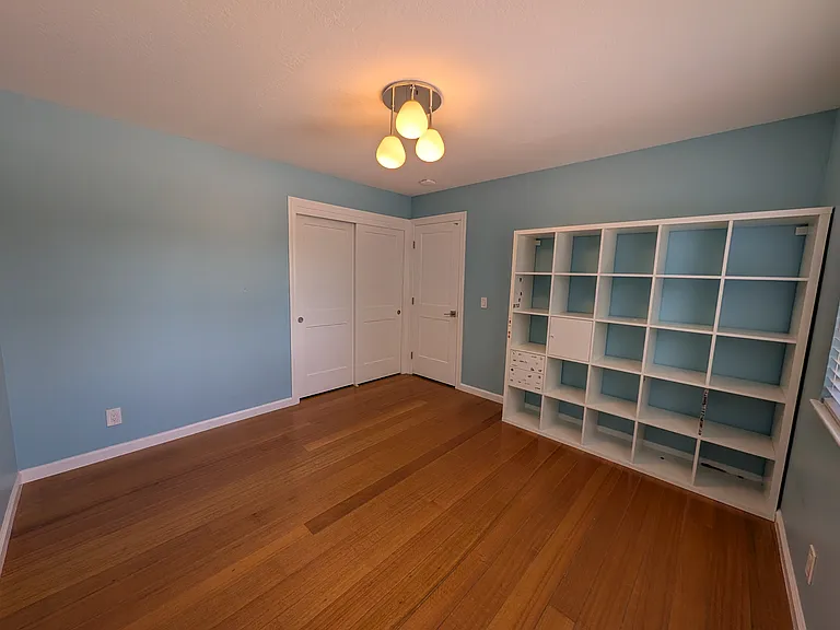 Front bedroom facing the door.