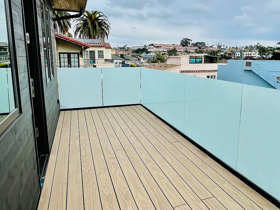Large private deck with privacy railing.