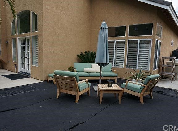 Great Sitting area off to the side of the house in the backyard