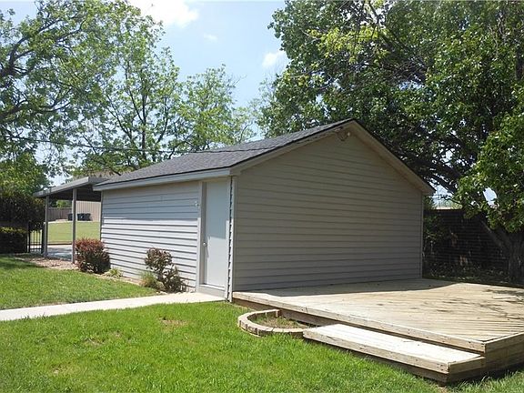 New sidewalk to the detached garage, large deck - great for entertaining!