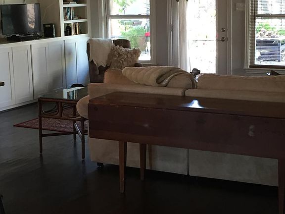 living area/book case offers large opening for TV w/ excelle