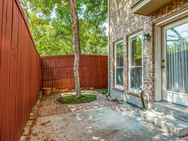 Private backyard with turf and privacy fence