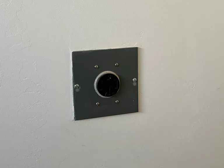 Garage outlet to charge vehicle