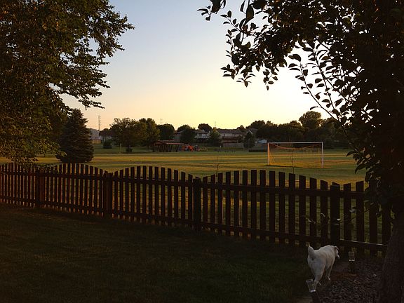 backs to private park