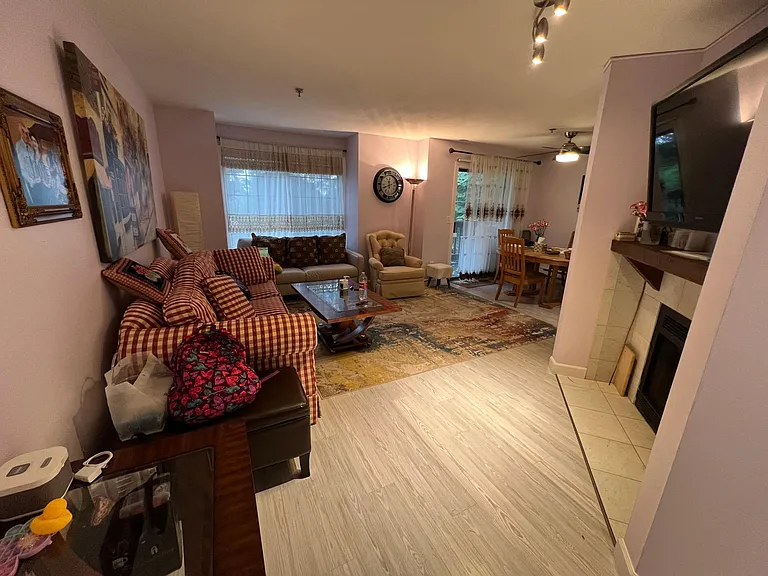 Open space living room flowing into the formal dining area
