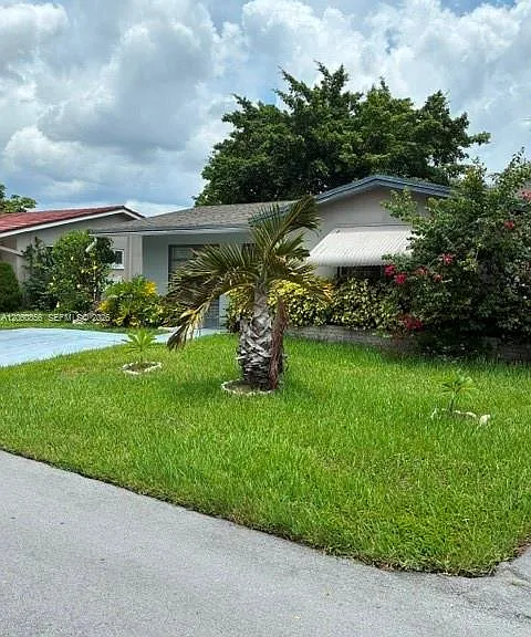 7311 NW 57th Dr — Photo 1