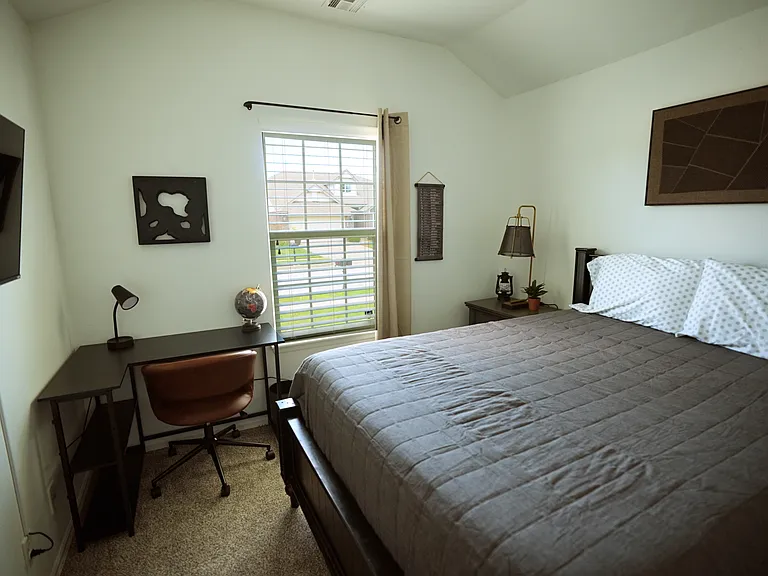 Queen Bed with dedicated workspace.