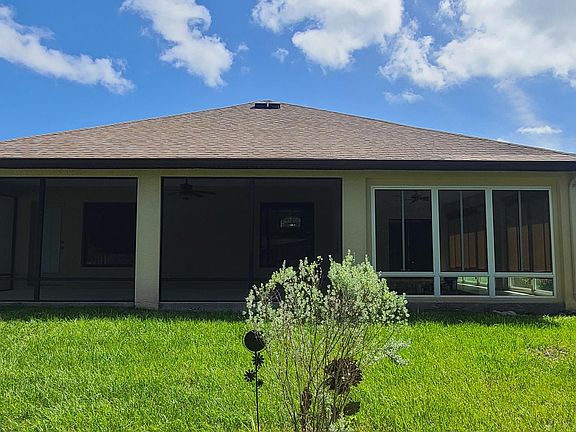 Screened back porch to the left Florida room to the right