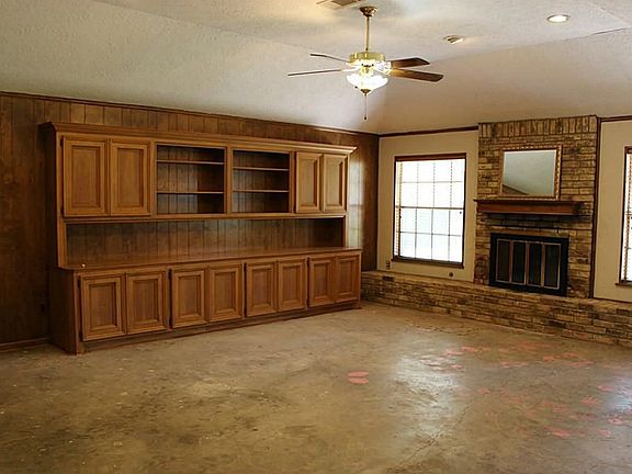Huge living room with fireplace and massive built-ins